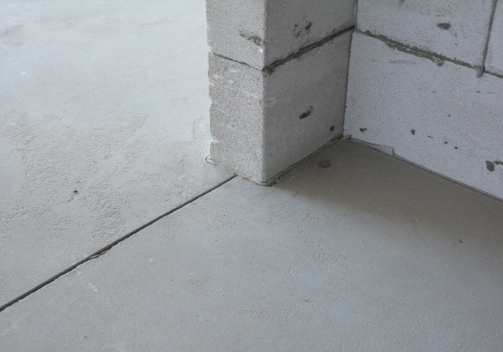 A concrete subfloor with minor imperfections