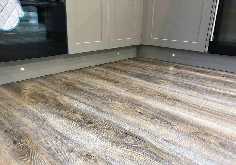 Oak effect lino/vinyl flooring installed in a kitchen